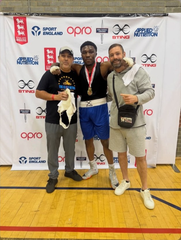 Taha Barry with his Camp Detox coaches after winning the England Development final